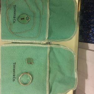 Broken Tiffany necklace/keyhole charmTiffany ring.