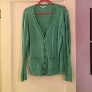 Green light knit sweater.