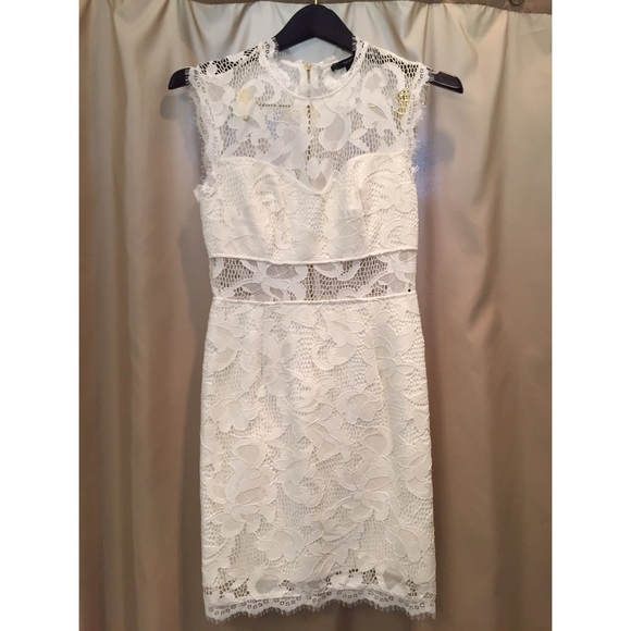 Sexy & sophisticated white lace body con dress