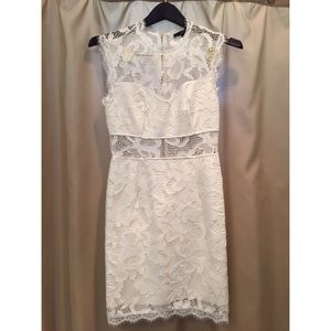 Sexy & sophisticated white lace body con dress