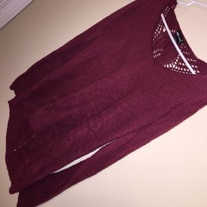 Deep red sweater