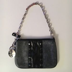 Small, studded Calvin Klein wristlet