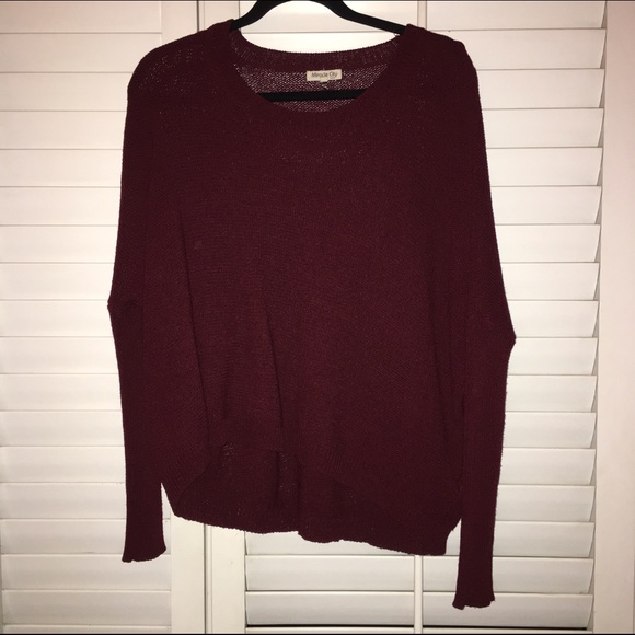 loose-fitting maroon sweater