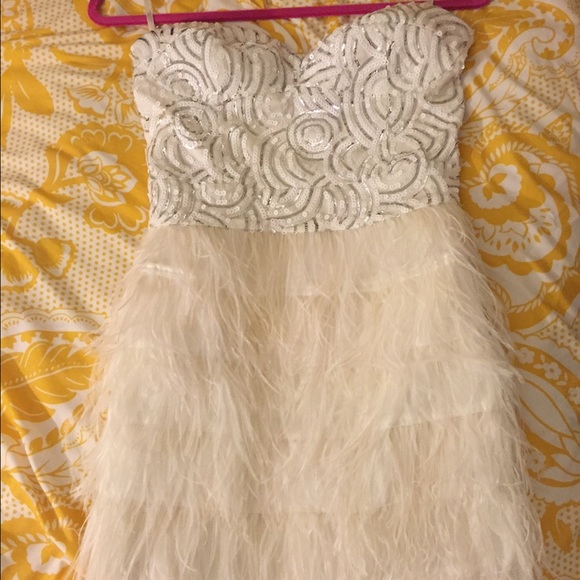 white bebe feather dress with sequins