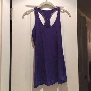 Lululemon "Cool Racerback" in purple.