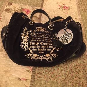 Juicy Couture. Black hand bag