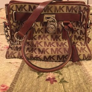 Michael Kors brown and tan MK print shoulder bag.