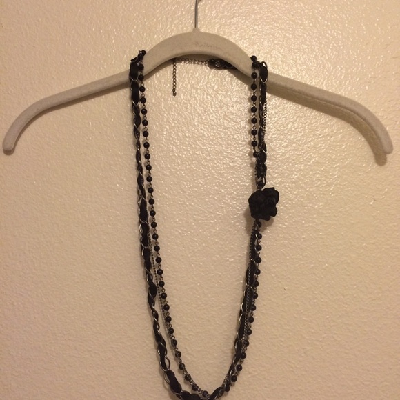 Black and silver long necklace.