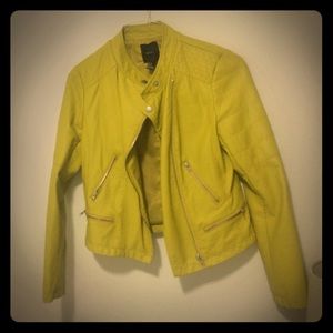 Yellow faux- leather jacket.