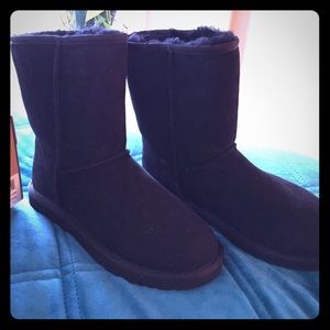 Brand NEW black UGGS. Never been worn.