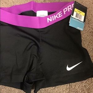 Black and purple Nike spandex