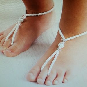 White beaded barefoot sandals
