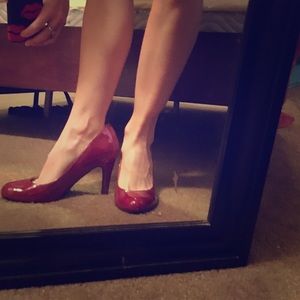 Crimson patent leather heels