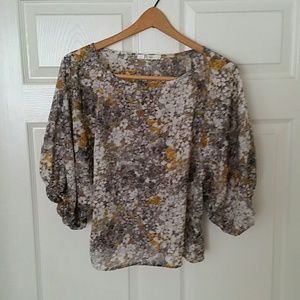 Semi sheer floral top.