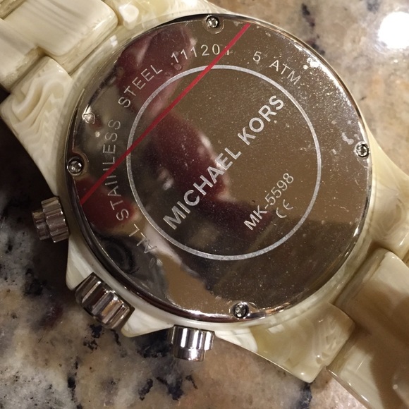 Michael Kors watch embezzled face