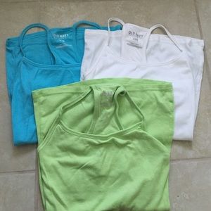 Three racer back built in bra shirts