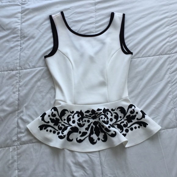 ✨White peplum top W/ Black accent embellishments✨