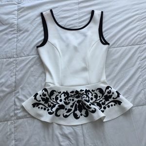 ✨White peplum top W/ Black accent embellishments✨