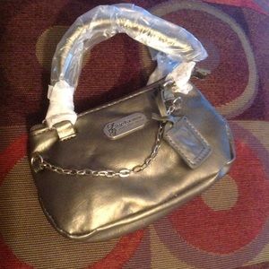 Lori Greiner logo pewter phone purse