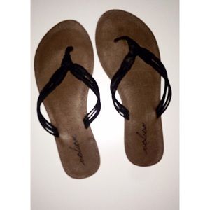 Black detail flip flops
