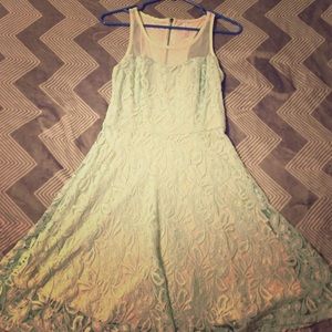 Teal & cream colored dress