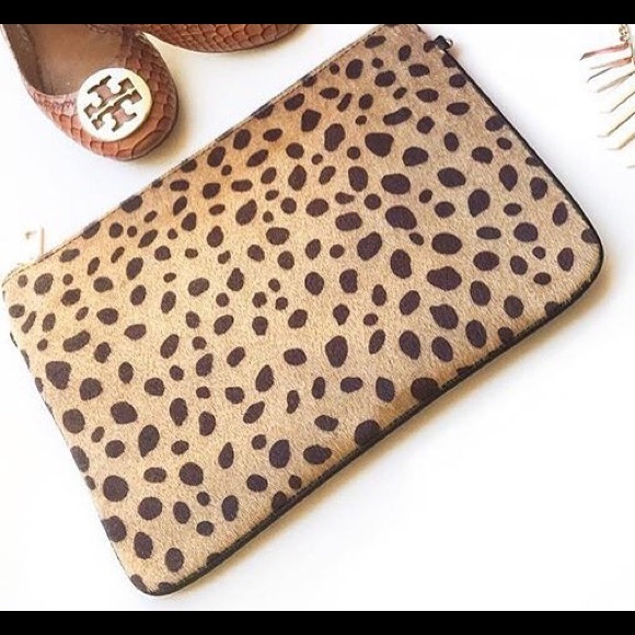 Animal print faux fur clutch