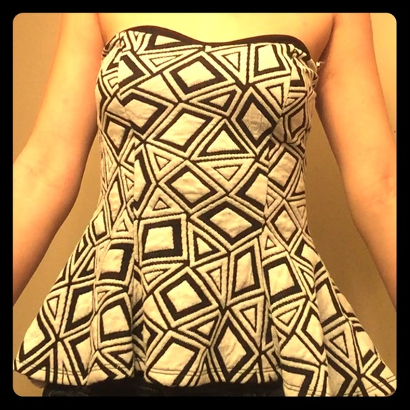 Black and white designed peplum top!