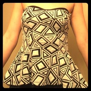 Black and white designed peplum top!