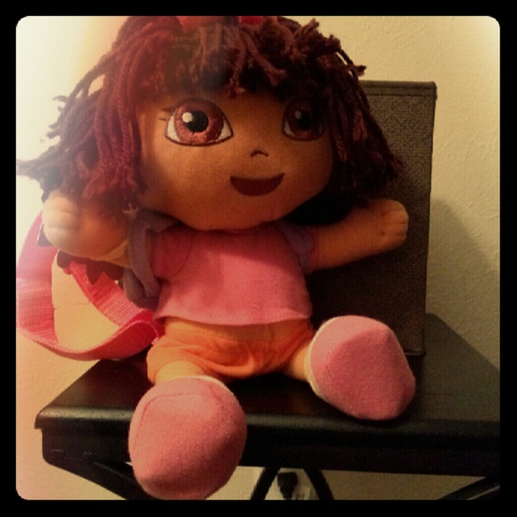 Dora backpack wering her backpack