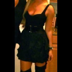 Black ruffled bottom, deep scoop neck dress