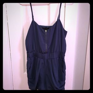 Navy romper with gold zipper