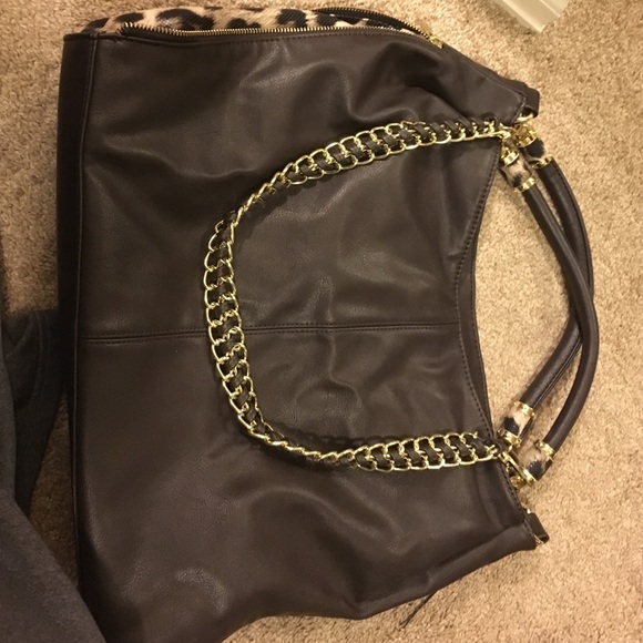 Large brown purse with cheetah print.