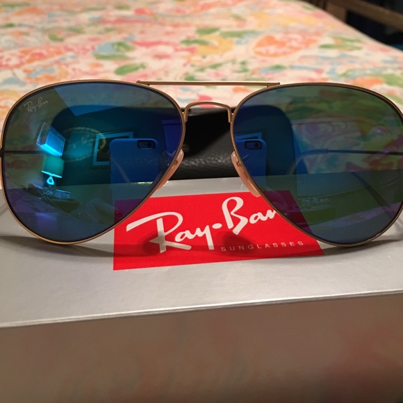 Ray Bans in Blue with Gold tone frame. PRICE FIRM!