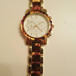 Brown and gold watch