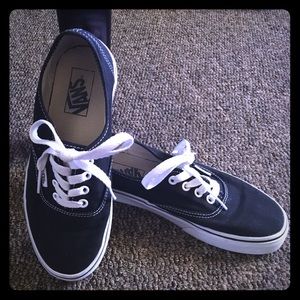 Black & white vans shoes