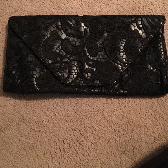 Black lace and leather clutch.
