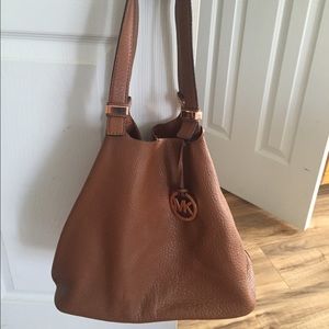 Gently used Michael Kors reversible shoulder bag.