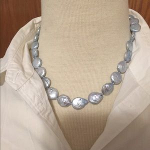 Light blue authentic coin pearl necklace.