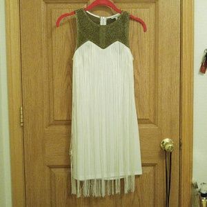 White and gold fringe dress