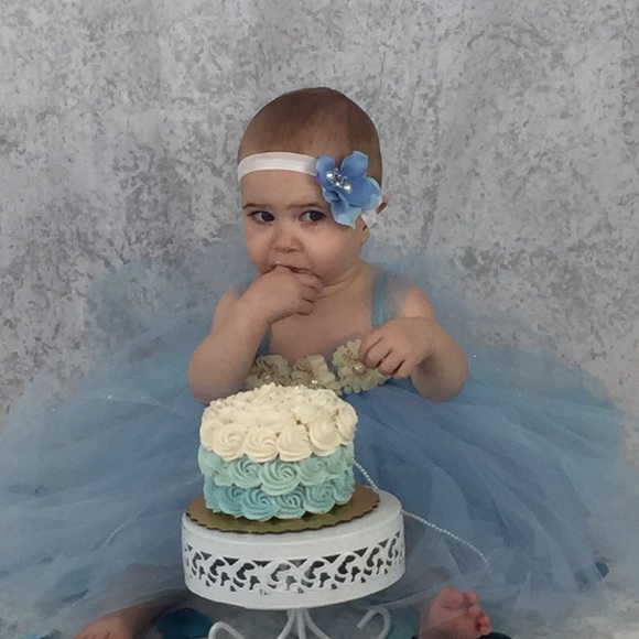 Blue flower headband with crystals in the middle
