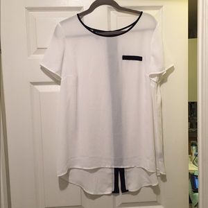 White blouse with black detail