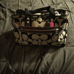 Black and gray coach purse