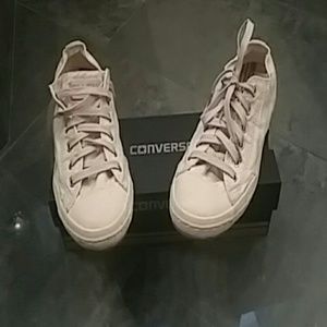 Creamed colored Converse low tops
