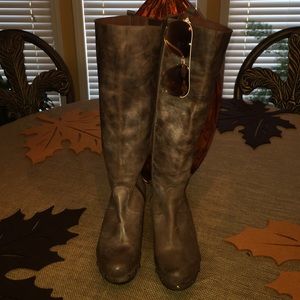 Brownish nailhead leather boots