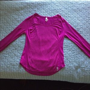 SOLD ON MERC: Under Armour athletic shirt