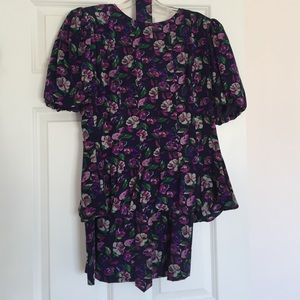 Matching print skirt and belted top.