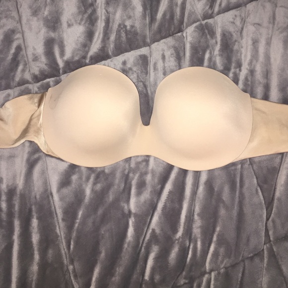 Nude strapless bra.