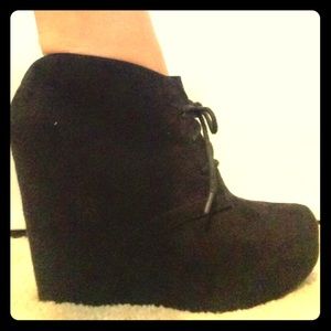 Black wedge booties