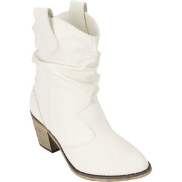 White cowboy above the ankle boots