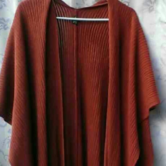 Poncho and necklace set.